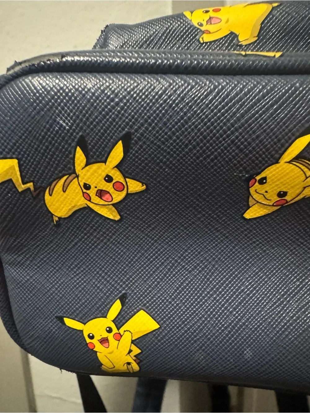 Loungefly Navy Mini Backpack with Yellow Pikachu Print